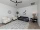 Living room with leather sofa and two armchairs at 14462 Fort Worth Cir, Port Charlotte, FL 33981