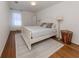 Bedroom with a queen-size bed and hardwood floors at 14462 Fort Worth Cir, Port Charlotte, FL 33981