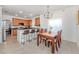Kitchen features a dining area with a wood table and chairs at 14462 Fort Worth Cir, Port Charlotte, FL 33981