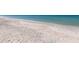 Beach scene showing white sand and tranquil ocean water at 14462 Fort Worth Cir, Port Charlotte, FL 33981