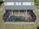 Overhead view of a screened-in pool and patio area, perfect for outdoor living at 14462 Fort Worth Cir, Port Charlotte, FL 33981