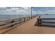 Long fishing pier extending over calm water at 14462 Fort Worth Cir, Port Charlotte, FL 33981