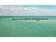 Wooden pier extending into calm waters at 14462 Fort Worth Cir, Port Charlotte, FL 33981