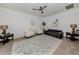 Living room with comfortable seating and large area rug at 14462 Fort Worth Cir, Port Charlotte, FL 33981