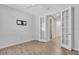 Bedroom with tile floor and French doors opening to hallway at 20450 Bandera Pl, Venice, FL 34293