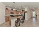 Modern kitchen with stainless steel appliances and granite countertops at 12297 Canavese Ln, Venice, FL 34293