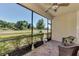 Relaxing screened patio overlooking a pond at 12297 Canavese Ln, Venice, FL 34293