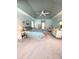 Relaxing main bedroom with vaulted ceilings and ensuite bath at 2454 Sonoma W Dr, Nokomis, FL 34275