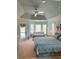 Large main bedroom with private access to the pool area at 2454 Sonoma W Dr, Nokomis, FL 34275
