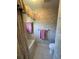 Clean bathroom with a bathtub, toilet and shower at 2454 Sonoma W Dr, Nokomis, FL 34275