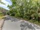 Mission Estates community entrance with attractive landscaping at 2454 Sonoma W Dr, Nokomis, FL 34275