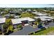 Aerial image showcasing the community layout and surrounding landscape at 1708 Lakeside Dr # 1710-B, Venice, FL 34293