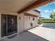 Condo entry with decorative door and landscaping at 1708 Lakeside Dr # 1710-B, Venice, FL 34293