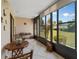Sunroom with ample natural light and outdoor views at 1708 Lakeside Dr # 1710-B, Venice, FL 34293