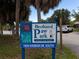 Sign for Brohard Paw Park with park information at 1708 Lakeside Dr # 1710-B, Venice, FL 34293