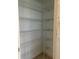Walk-in pantry with wire shelving for ample storage at 1498 Maseno Dr, Venice, FL 34292