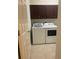 Laundry room with washer, dryer, and cabinets at 1498 Maseno Dr, Venice, FL 34292