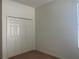 Bedroom with double door closet and window at 1498 Maseno Dr, Venice, FL 34292