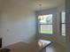 Dining area with a light and airy feel, featuring a chandelier at 1498 Maseno Dr, Venice, FL 34292
