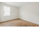 Spacious bedroom with tile flooring and a window at 16090 Highgate St, Port Charlotte, FL 33953