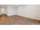 Bright hallway with wood-look tile flooring at 16090 Highgate St, Port Charlotte, FL 33953
