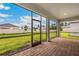 Screened porch overlooking backyard at 16090 Highgate St, Port Charlotte, FL 33953