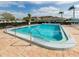 Clean, refreshing community pool with surrounding patio at 1015 Beach Manor Cir # 53, Venice, FL 34285