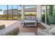 Relaxing patio with wicker furniture and view of the pool at 15177 Spanish Point Dr, Port Charlotte, FL 33981