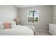 Bedroom with a dresser and window with blinds at 15177 Spanish Point Dr, Port Charlotte, FL 33981