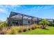 Relaxing pool and patio area with screened enclosure at 15177 Spanish Point Dr, Port Charlotte, FL 33981