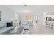 Living area with light-colored sofa, armchairs, and coffee table at 15177 Spanish Point Dr, Port Charlotte, FL 33981