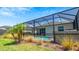 Private pool and patio area with outdoor kitchen at 15177 Spanish Point Dr, Port Charlotte, FL 33981
