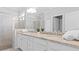 Elegant bathroom with double vanity and a walk-in shower at 15177 Spanish Point Dr, Port Charlotte, FL 33981