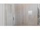 Clean shower with tiled walls and glass door at 15177 Spanish Point Dr, Port Charlotte, FL 33981