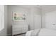 Bedroom with dresser and large window, plenty of light at 15177 Spanish Point Dr, Port Charlotte, FL 33981
