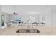 Kitchen with island, granite countertops, and stainless steel appliances at 15177 Spanish Point Dr, Port Charlotte, FL 33981