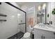 Bathroom with a walk-in shower and white vanity at 284 Bocelli Dr., Nokomis, FL 34275