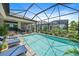 Inviting screened pool and patio area, perfect for relaxation at 284 Bocelli Dr., Nokomis, FL 34275