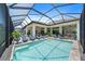 Relaxing pool with covered patio and ample lounge chairs at 284 Bocelli Dr., Nokomis, FL 34275