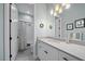 Light and bright bathroom with a white vanity and bathtub at 284 Bocelli Dr., Nokomis, FL 34275