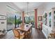 Bright dining room with sliding glass doors opening to the backyard at 284 Bocelli Dr., Nokomis, FL 34275
