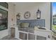 Stainless steel grill with sink and built in refrigerator at 284 Bocelli Dr., Nokomis, FL 34275