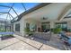 Outdoor living space with seating, ping pong table, and covered patio at 284 Bocelli Dr., Nokomis, FL 34275