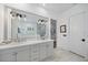 Elegant bathroom with double vanity and marble flooring at 284 Bocelli Dr., Nokomis, FL 34275