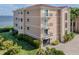 Attractive building exterior with balconies and water views at 95 N Marion Ct # 131, Punta Gorda, FL 33950