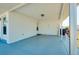 Covered carport area adjacent to the house entrance at 472 Circlewood Dr # L9, Venice, FL 34293