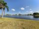 Community lake surrounded by mobile homes at 109 Lakeview Dr, North Port, FL 34287