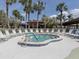 Relaxing community hot tub surrounded by lounge chairs at 109 Lakeview Dr, North Port, FL 34287