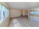 Living room with abundant natural light and views to the outdoors at 109 Lakeview Dr, North Port, FL 34287
