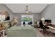 Living Room with view of pool and lanai at 1567 Waterford Dr, Venice, FL 34292